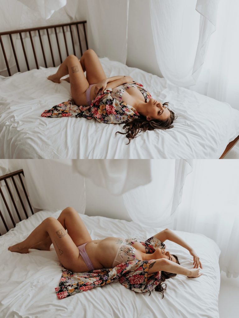 Brunette in floral lingerie lying across a white bed for empowering shoot 