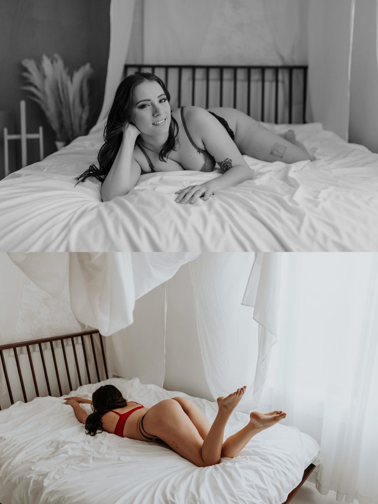 Tattooed woman lying across a bed in boudoir studio 