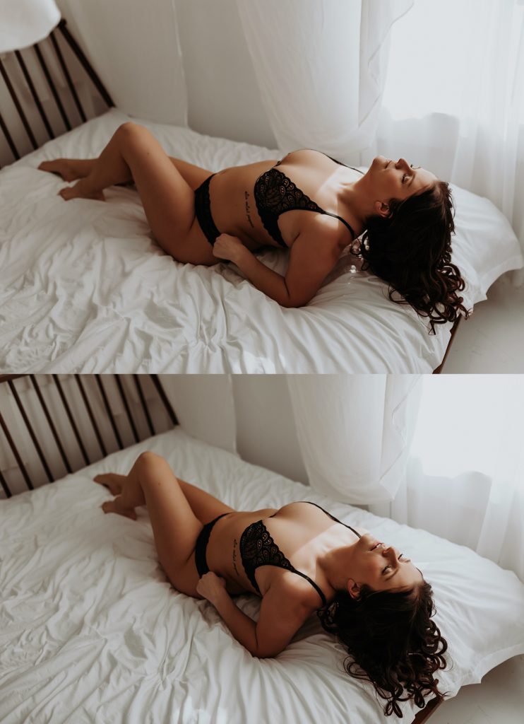 Lady with long hair lying across a bed in black bra by a Minneapolis boudoir photographer 