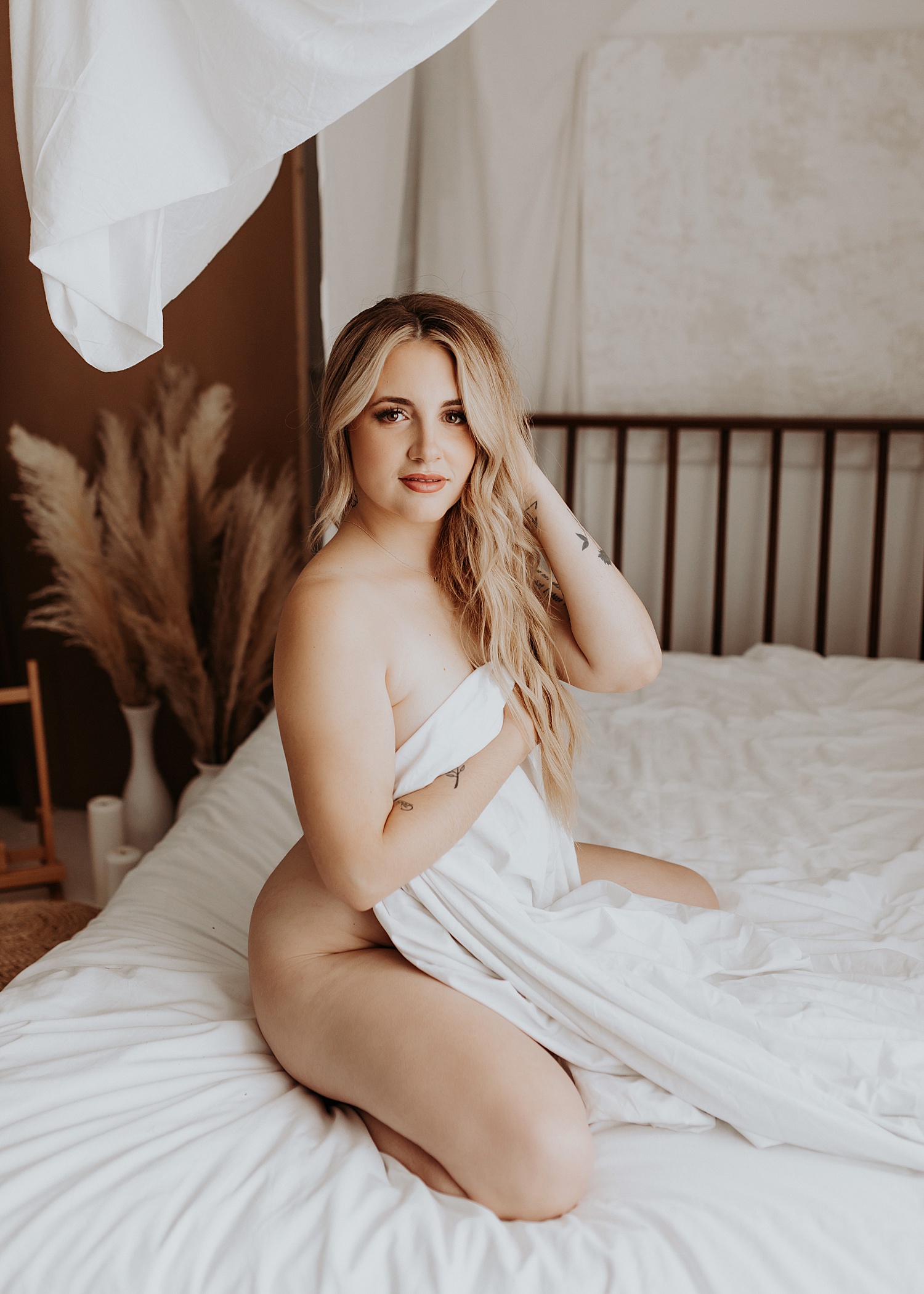 Blonde mom nude on a bed by Mary Castillo photography 