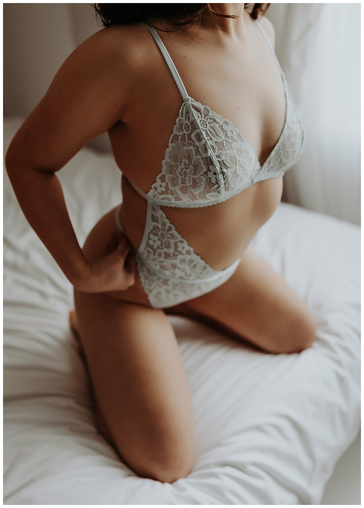 Female in baby blue lingerie for Mary Castillo Photography