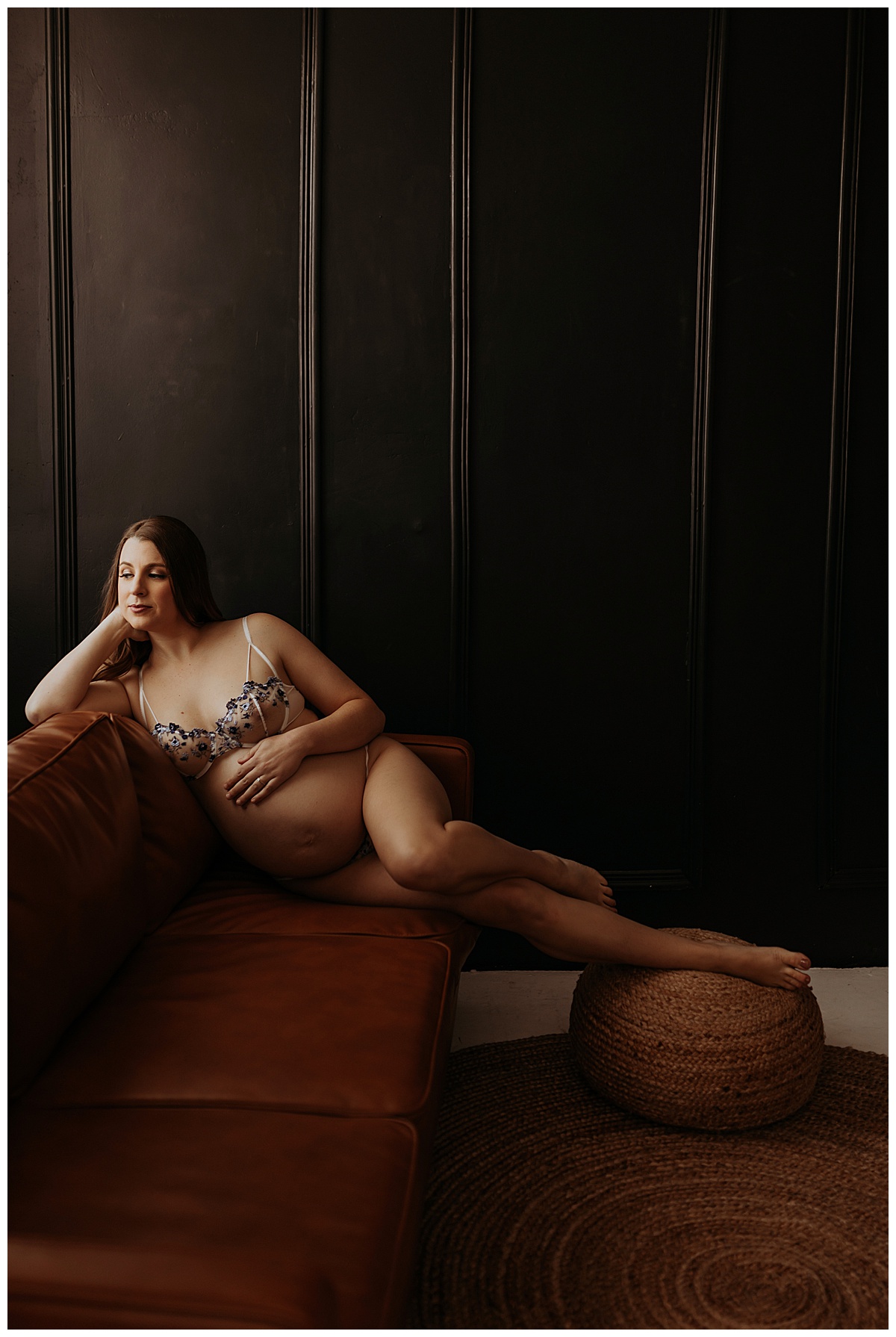 Mom sits on couch in lingerie for Minneapolis Boudoir Photographer