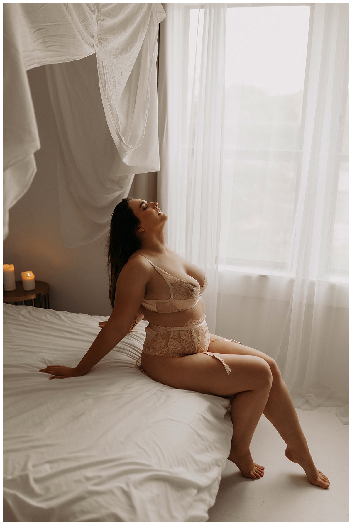Woman leans back onto a bed in lingerie demonstrating how you can Discover Your Inner Beauty