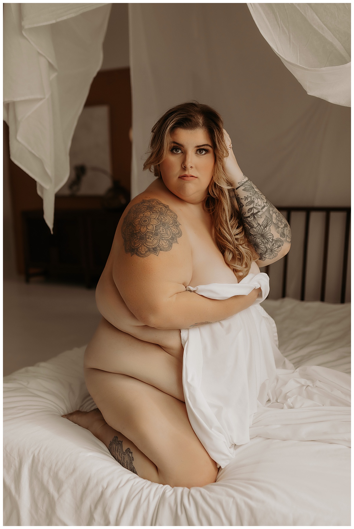 Lady covers body with towel for Mary Castillo Photography