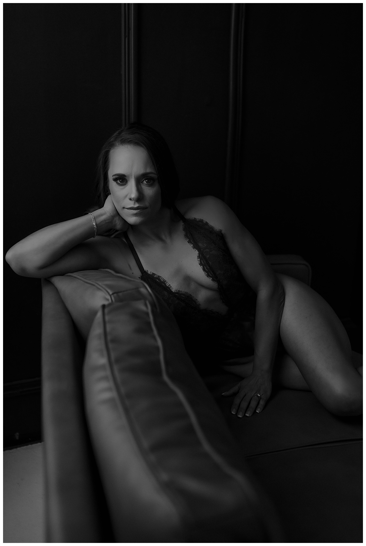 Woman sits on the chair in lingerie for Mary Castillo Photography