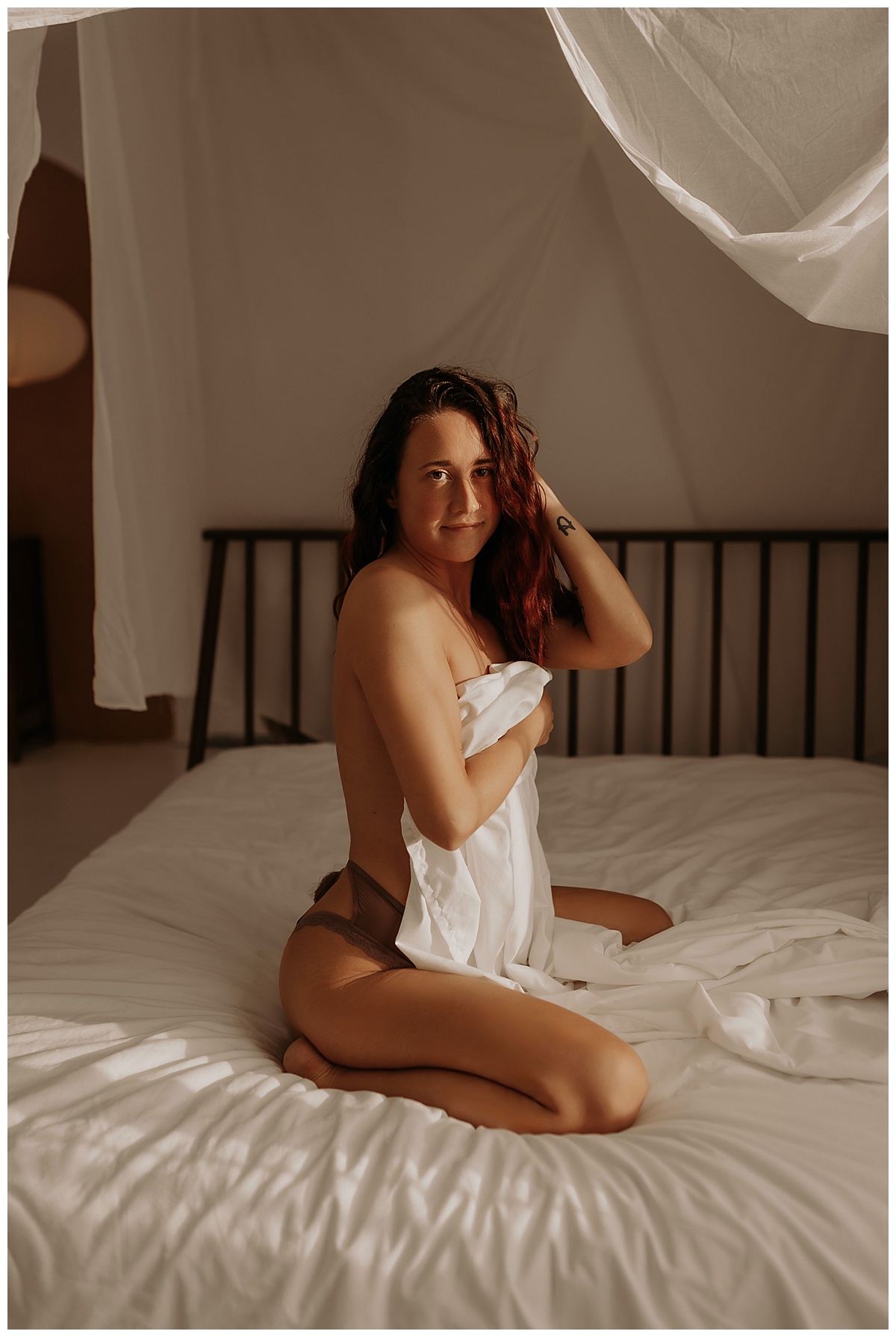 Adult covers body with sheet using 3 Tips For Your Boudoir Session 