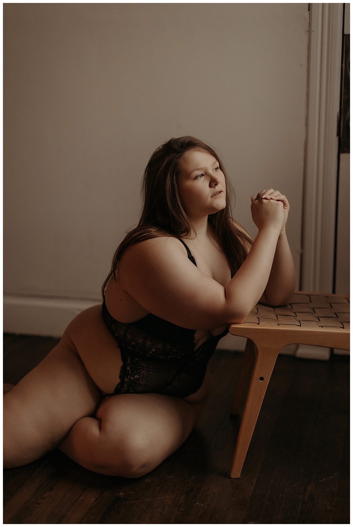 Person leans onto a stool for Mary Castillo Photography