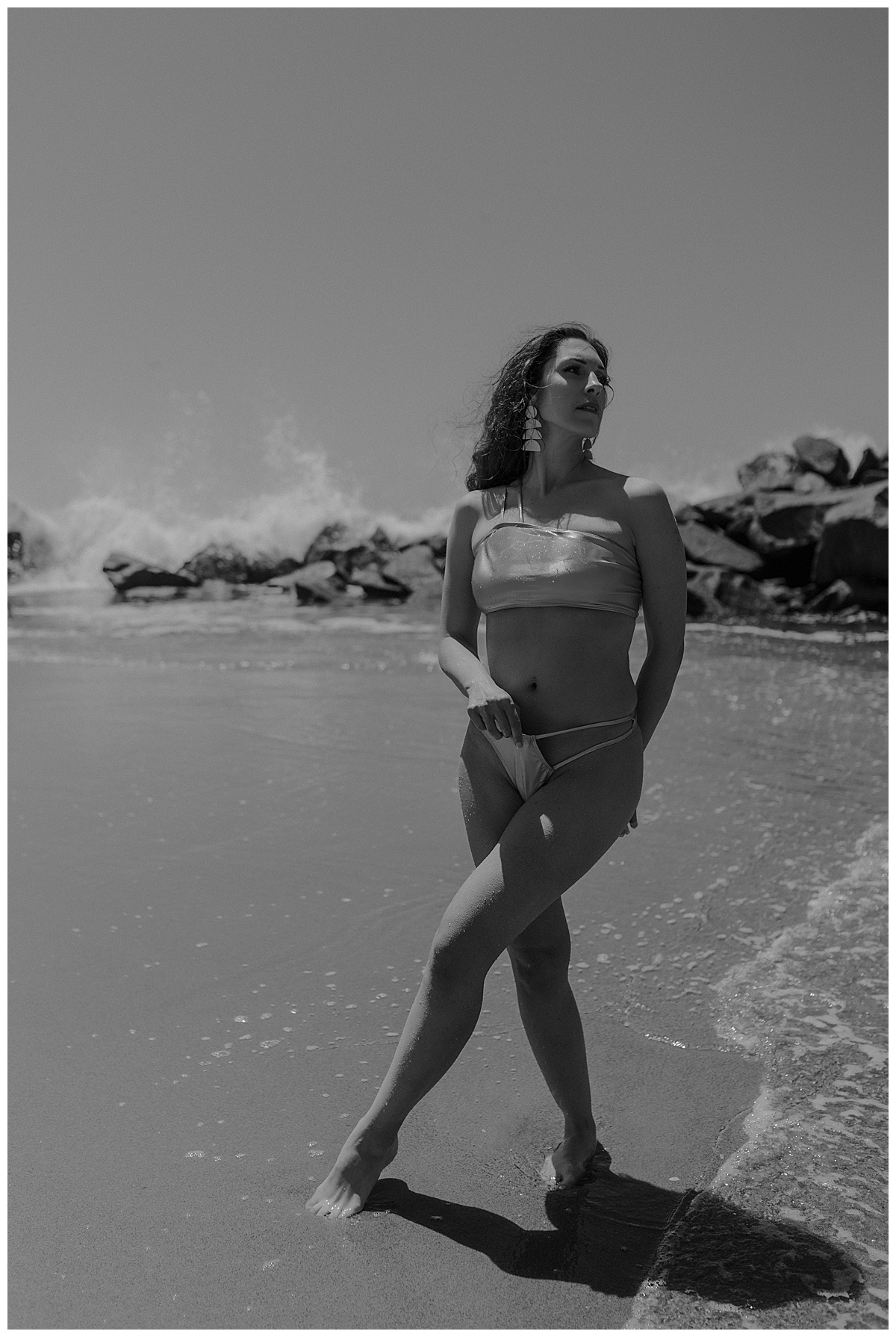 Female stands tall on the beach for Minneapolis Boudoir Photographer