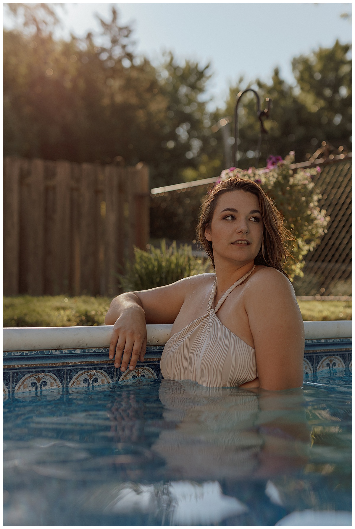 Female stands in the pool for Minneapolis Boudoir Photographer