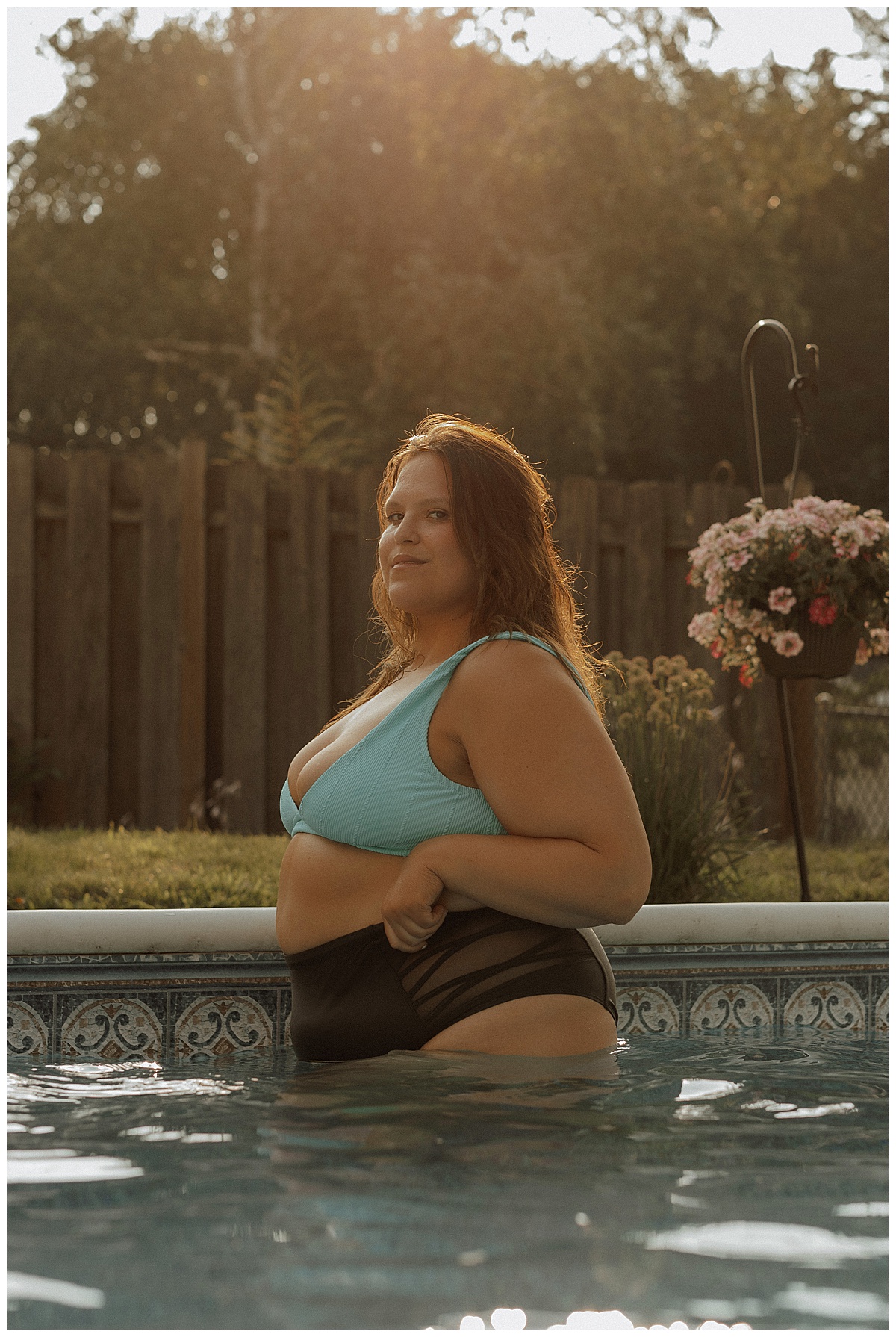 Woman wears blue bathing suit top after following What to Wear for Your Pool Session 