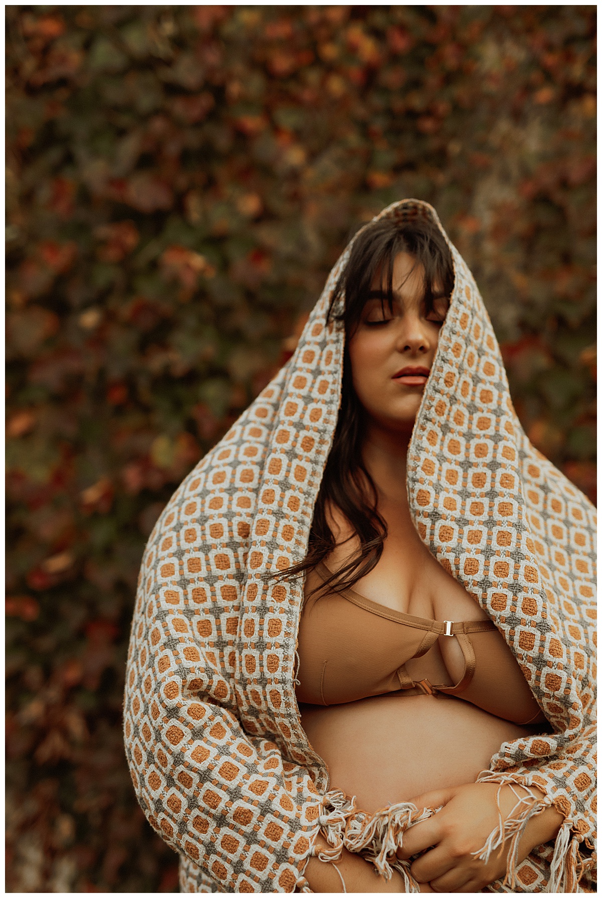 Woman wraps blanket around her face for Mary Castillo Photography