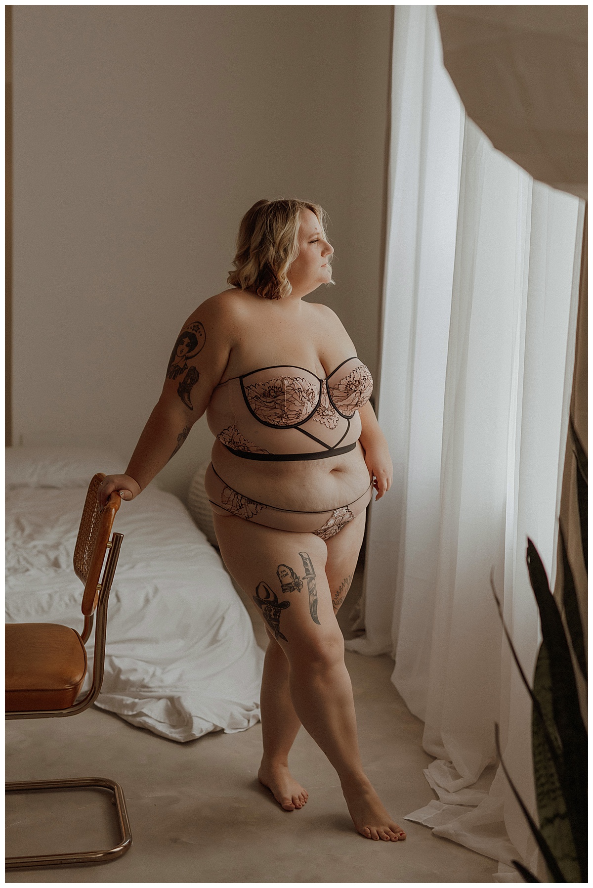 Adult wears lingerie for Minneapolis Boudoir Photographer