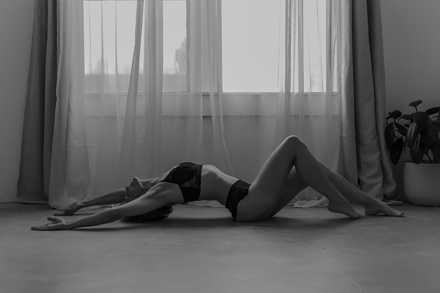 older lady in lingerie on studio floor in Minneapolis studio 